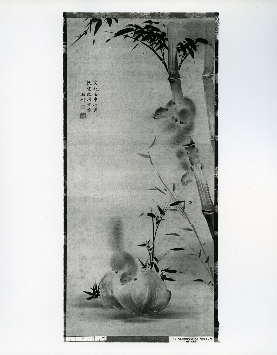 Squirrels on Bamboo and Rock